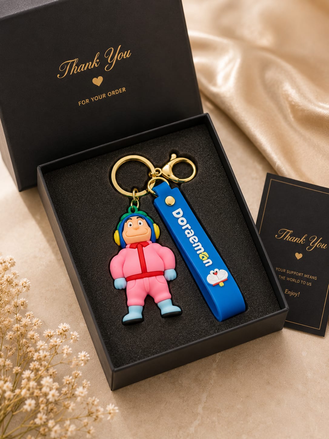 Cute Winter Boy Silicone Keychain with Wrist Strap – Premium Cartoon Bag Charm | Sajawat Bazar